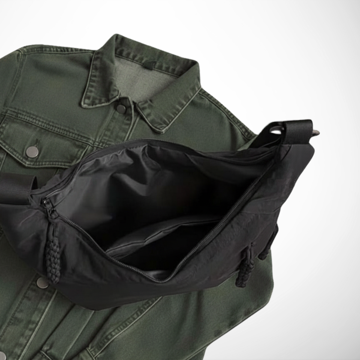 Green jacket with a black bag on a white background