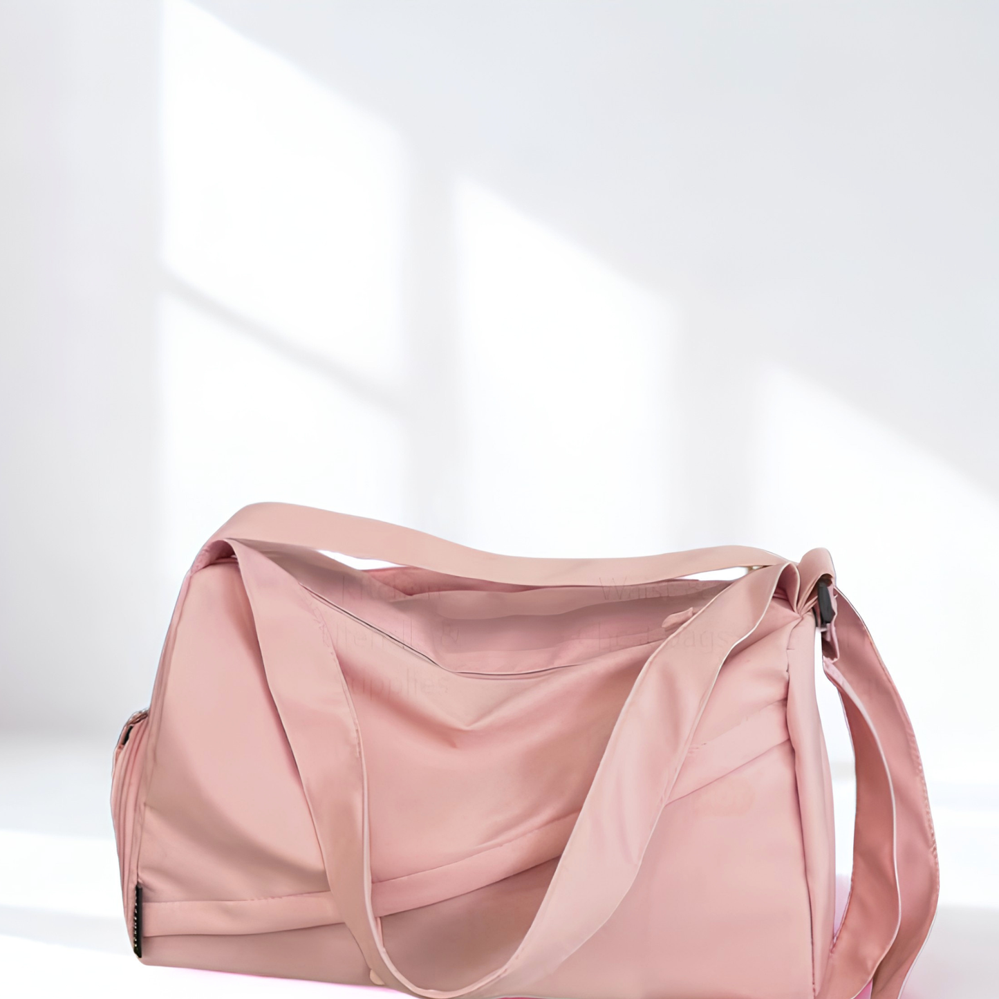 Pink duffel bag with white background
