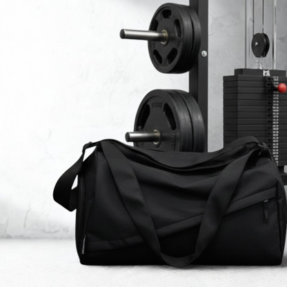 black duffel bag on gym floor